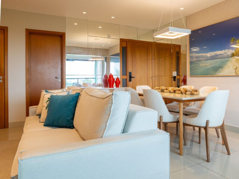 Stylish living room in Salvador, Brazil featuring modern decor, cozy furniture, and vibrant accents.