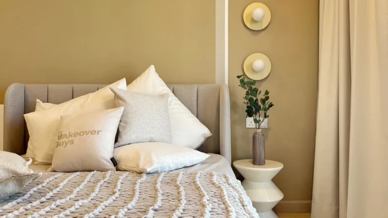 A modern bedroom featuring a comfortable bed and elegant interior design elements, perfect for a cozy ambience.
