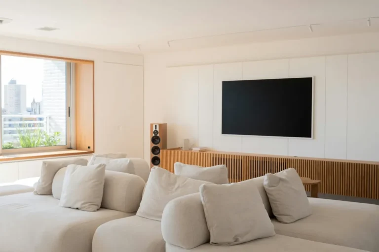 Modern living room with large sectional sofa and tv