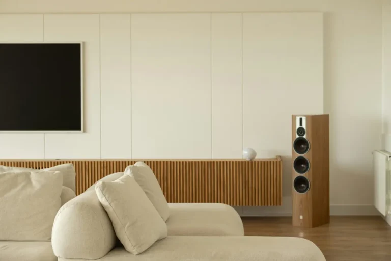 Modern living room with sectional sofa and speaker
